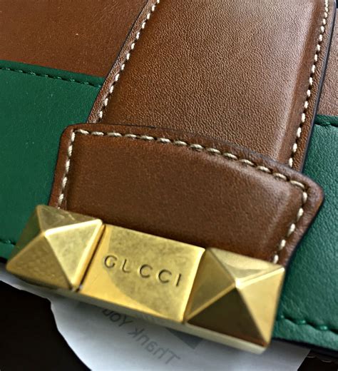 where can i get a gucci wallet repaired|Gucci purse repair near me.